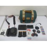 A Canon EOS 1DS Mark III with charger, batteries, camera bag, accessories etc