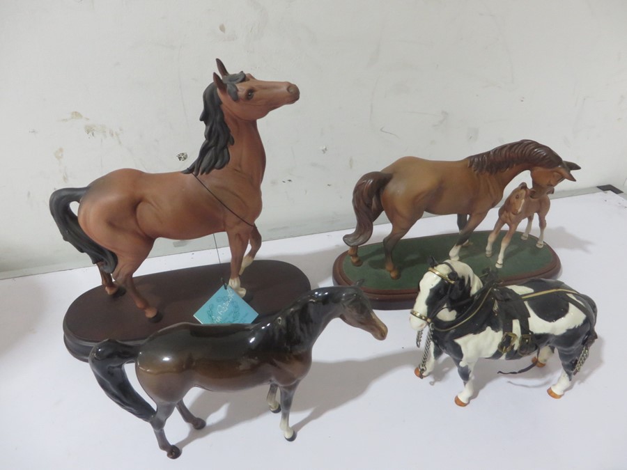 Four Beswick horses - 'First Born' on stand, 'Spirit of Wisdom' on stand, Piebald and a Bay