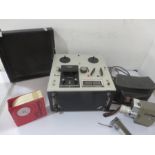 Akai Solid State 1720L four Track Stereophonic reel to reel player along with a Sabre 8 cine camera