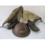 A World War II helmet along with a pair of fur lined airman's boots ( A/F)