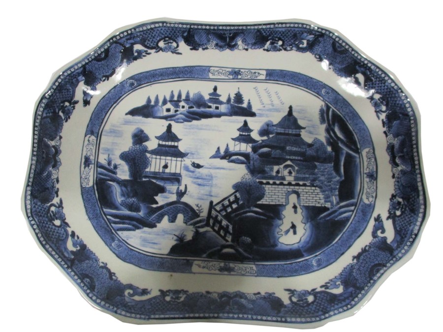 A blue and white Ironstone china meat plate decorated in the Chinese style