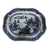 A blue and white Ironstone china meat plate decorated in the Chinese style