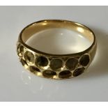 An unmarked ring, possibly 18ct - 2.6g