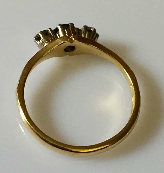 An 18ct gold ring with sapphire and diamonds. - Image 3 of 3