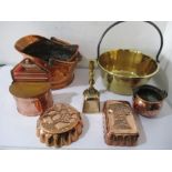 A collection of copper and brass to include wall mounted salt pot, jam pan etc.