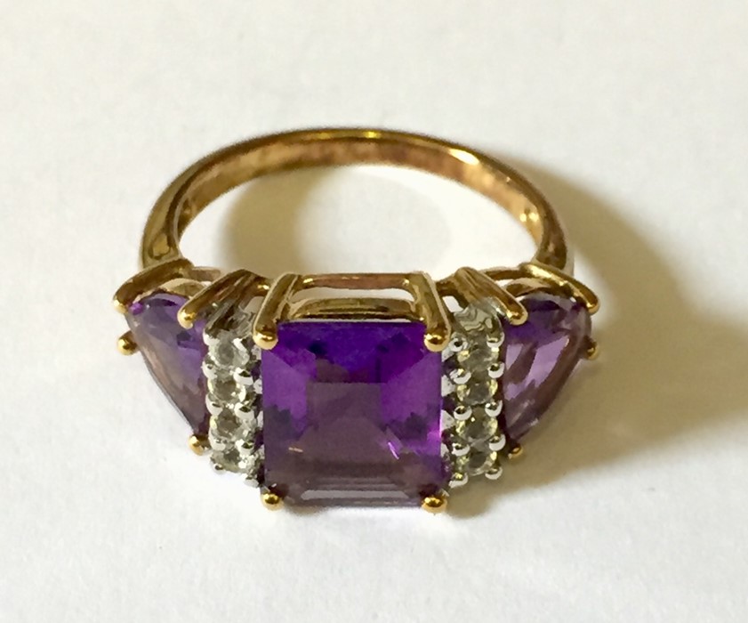 A 9ct gold amethyst and diamond dress ring. - Image 2 of 3