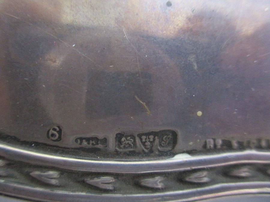 A hallmarked silver dressing table mirror along with a silver plated muffin fork - Image 3 of 9