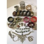 A collection of costume jewellery, including silver items