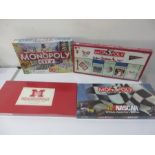 Four new in box Monopoly sets - Nascar, Monopoly City, St Louis Cardinals & Miamiopoly