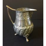 A small hallmarked silver cream jug, weight 101g