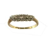 An 18ct gold and platinum diamond five stone ring