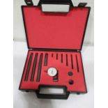 A cased Baty crankshaft alignment gauge