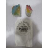 Two fragments of the Berlin Wall, 1989, largest 5.5 cm x 4 cm approx