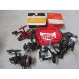 A collection of fishing reels