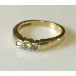 An 18ct gold diamond 3 stone ring