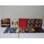 A collection of nine Queen 12 inch singles