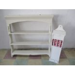 A painted hanging shelf along with a baguette box