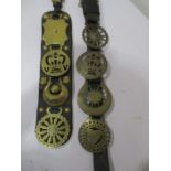 Two sets of horse brasses on leather straps
