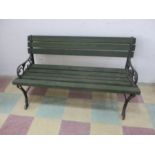 A garden bench with metal ends