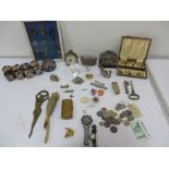 A collection of interesting items including paperweight, badges, 925 watch, lighters, pen knives,