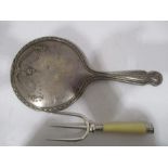 A hallmarked silver dressing table mirror along with a silver plated muffin fork