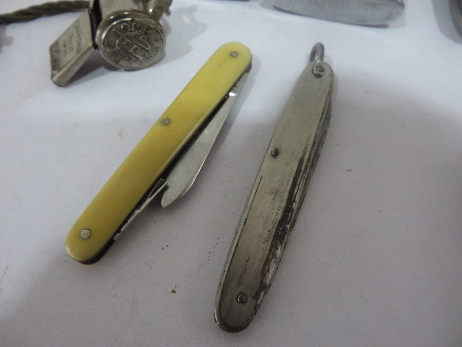 A collection of pen knives, lighters etc including a hallmarked silver penknife and 1945 penknife - Image 5 of 11