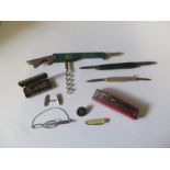 A small collection of items including Swiss army knife, 925 silver Tiffany & Co penknife, tie clip