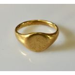 An 18ct gold signet ring. Weight 5.4g