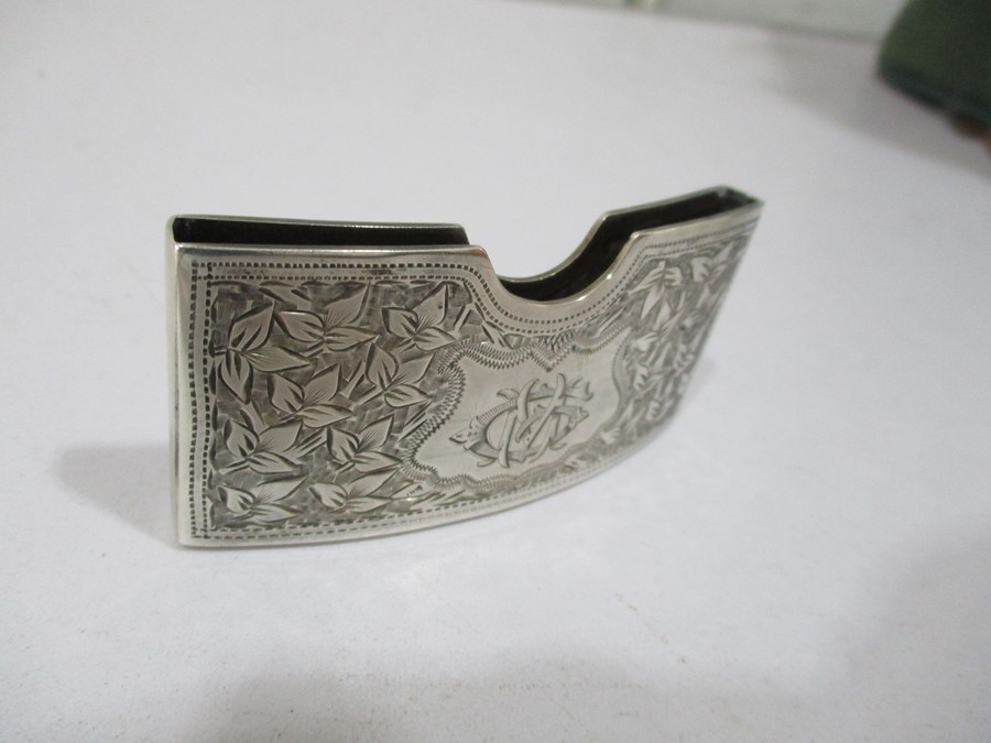 A hallmarked silver Victorian curved card case, Birmingham 1897