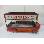 A 1950's Guiness tin plate omnibus advertising bottle crate