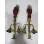 A pair of twin bell fly head terrets with tricolour horse hair plumes