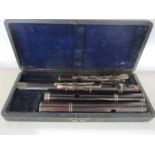 A 19th century cased Rudall & Rose flute with SCM mounts- some slight splitting to mouthpieces,