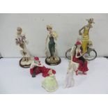 A collection of seven various figures of ladies