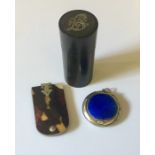 A hallmarked silver and enamelled pill box along with a tortoiseshell aide memoire and an ebony