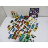 A collection of various Corgi diecast cars