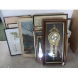 A collection of various pictures, mirrors etc