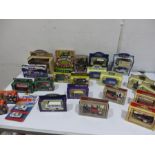 A collection of various boxed diecast cars including Tetleys, Smarties, Cadbury's, Oxford Diecast,