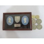 A framed pair of Wedgwood jasper plaques of oval form depicting Queen Elizabeth II and Prince