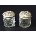 A pair of silver topped pots