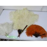 Two ostrich fans and a similar hairclip