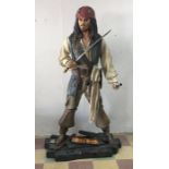 An Oxmox lifesize figure of Jack Sparrow, Pirates of the Caribbean on stand