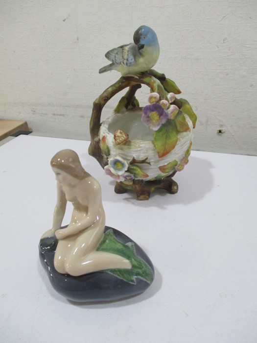 A Royal Copenhagen figure of a mermaid on a rock, a 100 year anniversary piece along with a