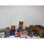 A collection of various model railway items including Hornby, transformers, controllers, power