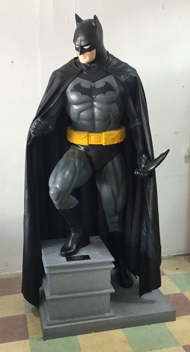 A lifesize limited edition figure of Batman on plinth, number 34/500, manufactured by Rubie's