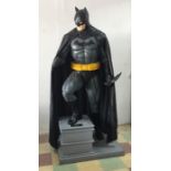 A lifesize limited edition figure of Batman on plinth, number 34/500, manufactured by Rubie's