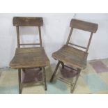 A pair of vintage folding chairs