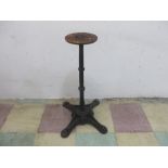 A cast iron bistro table base