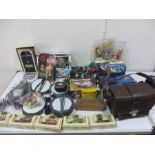 A collection of various games, camera, figures, cars etc