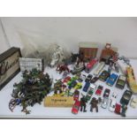 A collection of various diecast toys, cars, soldiers, games along with a collection of booklets