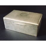 AN engine turned silver cigarette box